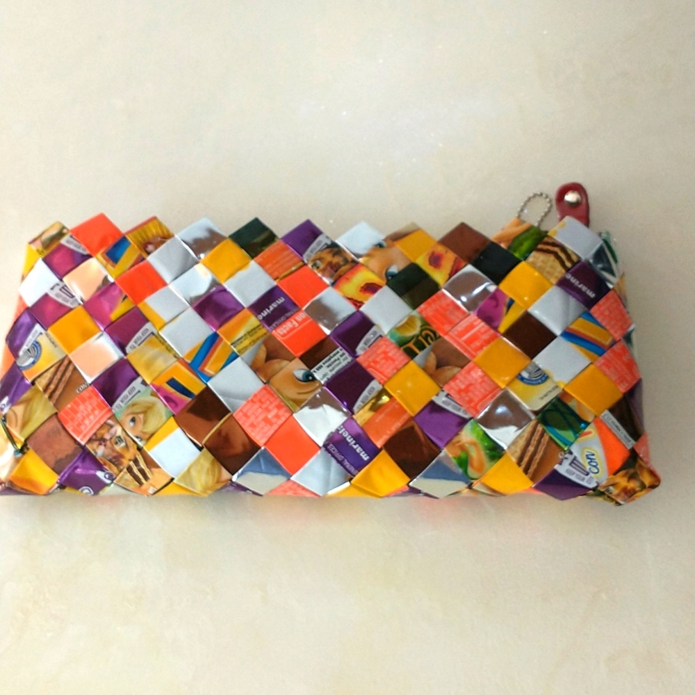 Nahui Ollin multi-color candy wrapper clutch.